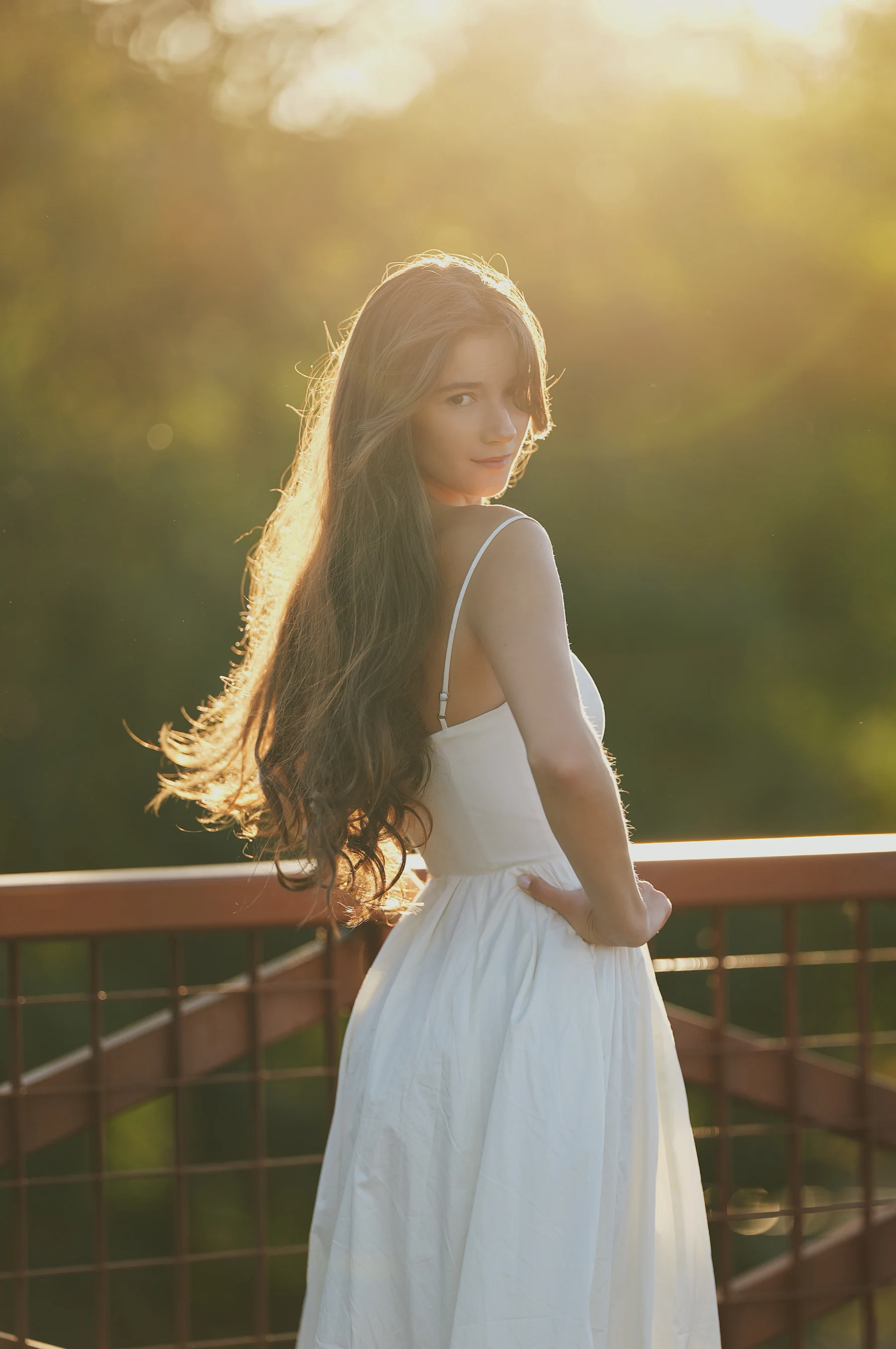 Rosina in a white sundress, golden hour bridge portraits 1 of 8