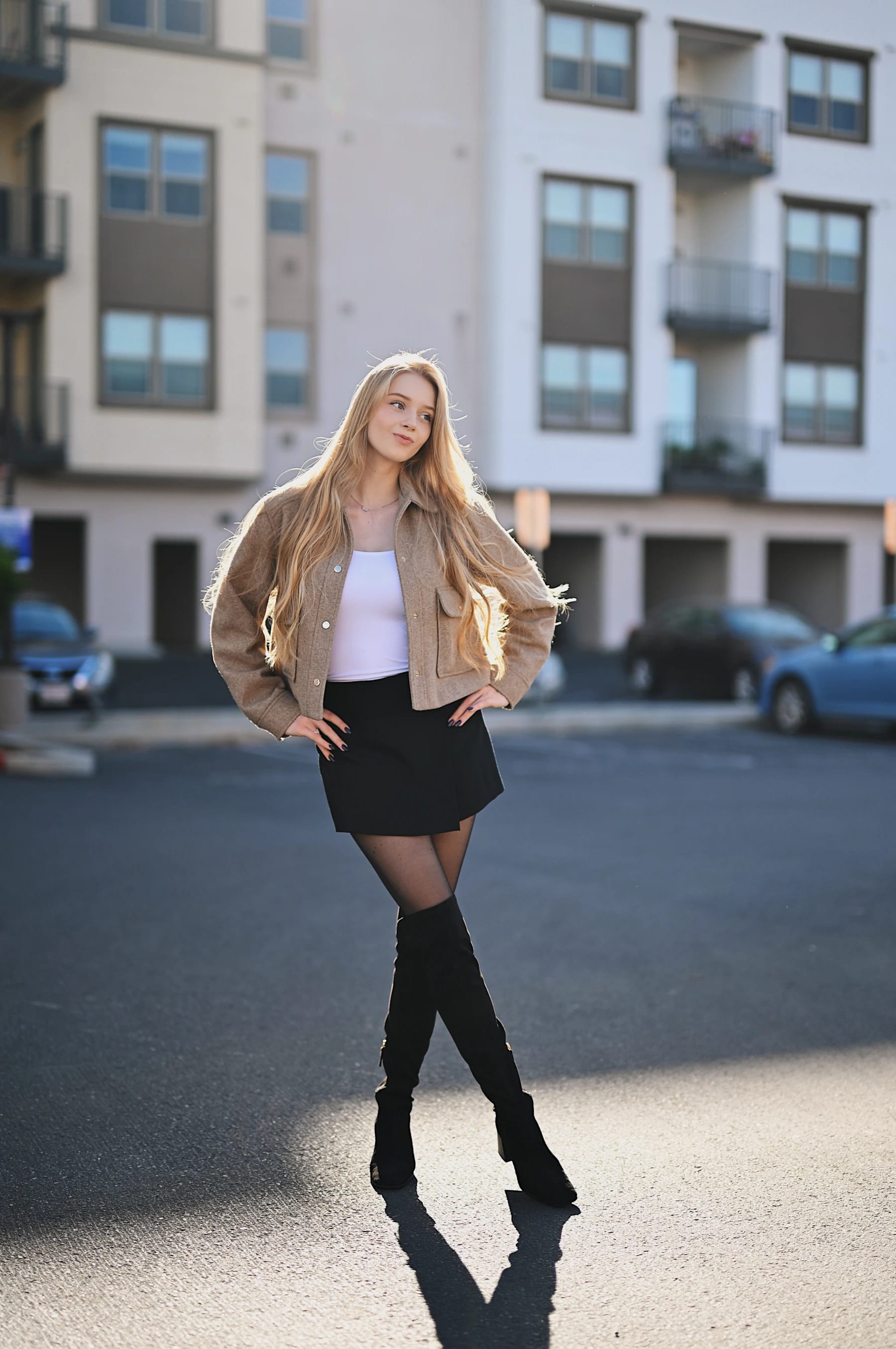 Sofia backlit fall portraits with apartment windows behind, Nikon Z6III 50mm f/1.2 1 of 16