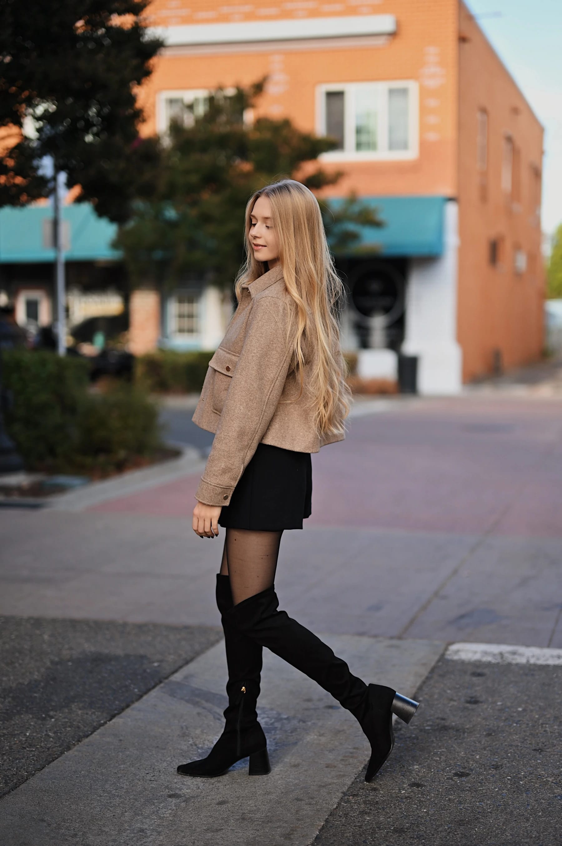 Sofia walking street style portraits in Roseville 1 of 3