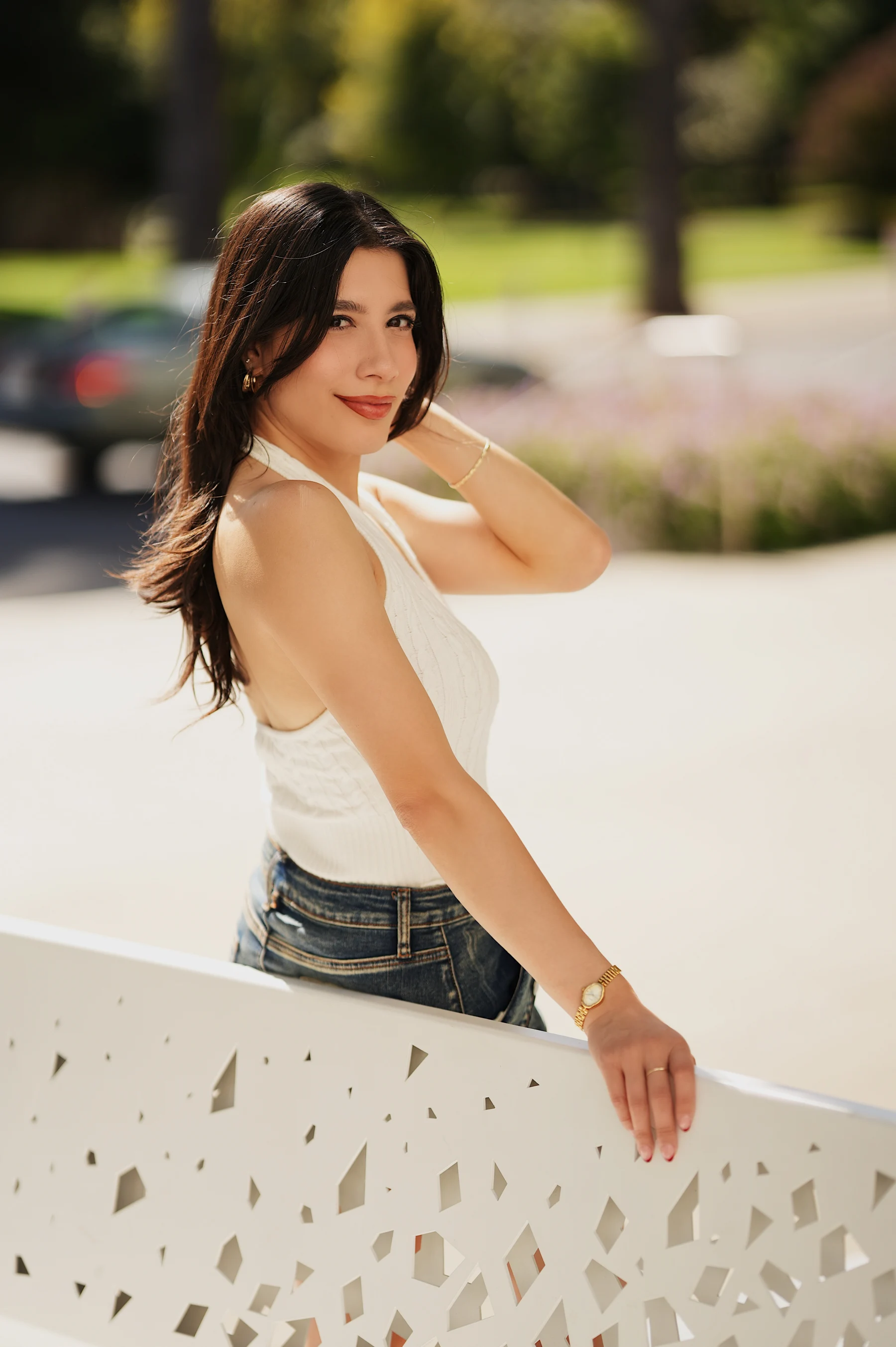 Aranza in a white tank top leaning on a ledge, Sigma 85mm F1.4